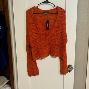 Orange knit sweater